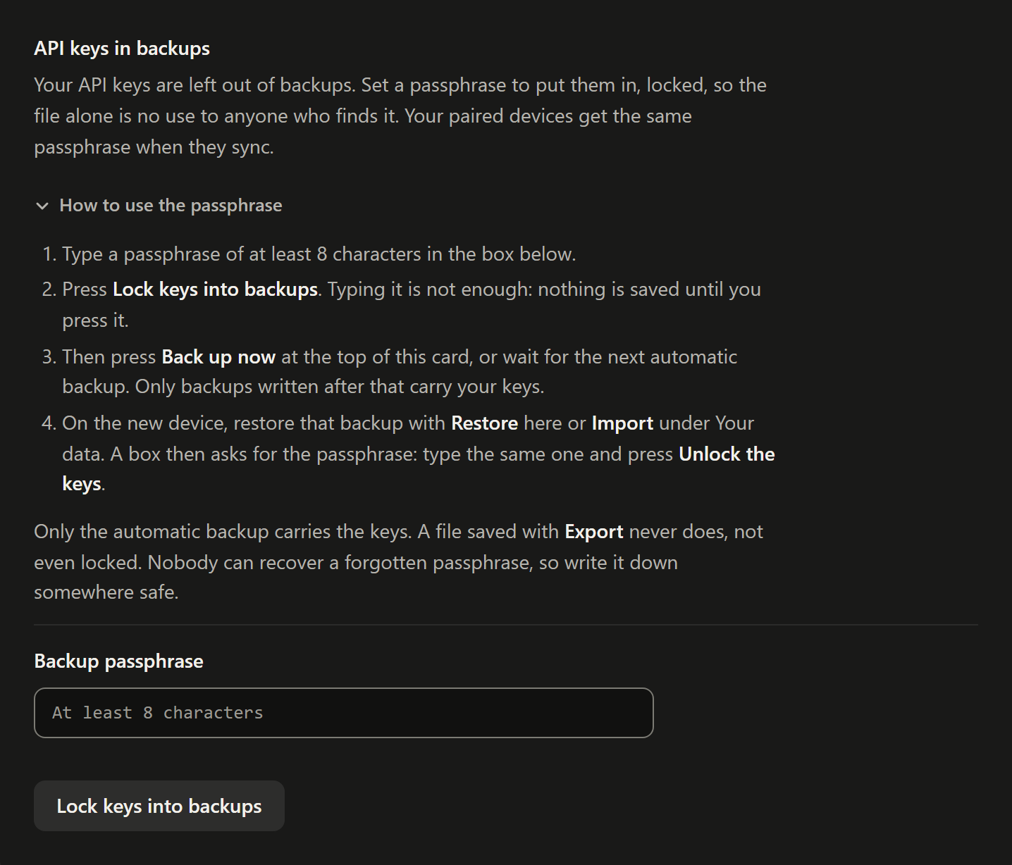 The API keys in backups part of the Automatic backup card: a line saying the API keys are left out of backups until a passphrase is set, an opened How to use the passphrase fold with the four steps, a note that only the automatic backup carries the keys and that a forgotten passphrase cannot be recovered, a Backup passphrase field and a Lock keys into backups button.